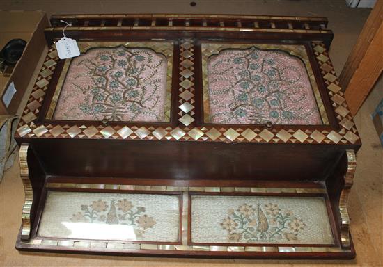 MOP inlaid islamic wall cupboard with textile insertioned panels to doors & back